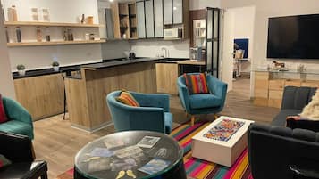 Royal Apartment | Living area | 55-inch flat-screen TV with digital channels, TV, Netflix