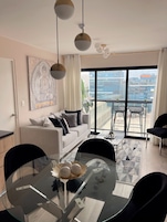 Panoramic Apartment | Living area | 55-inch flat-screen TV with digital channels, TV, Netflix