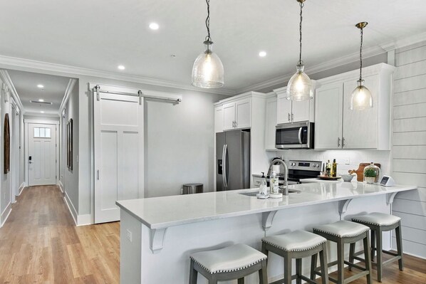 Fridge, microwave, oven, stovetop - Moorings 104 Beautiful Marsh Front Condo (Jekyll Island)