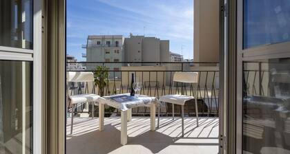 GuestHost - Large and bright apartment that can accommodate up to 5 people with 2 bedrooms and 2 bathrooms, which boasts a beautiful view of the Villa di Sant'Antonio and, in the distance, of the sea from the balcony and window. Located a few steps from