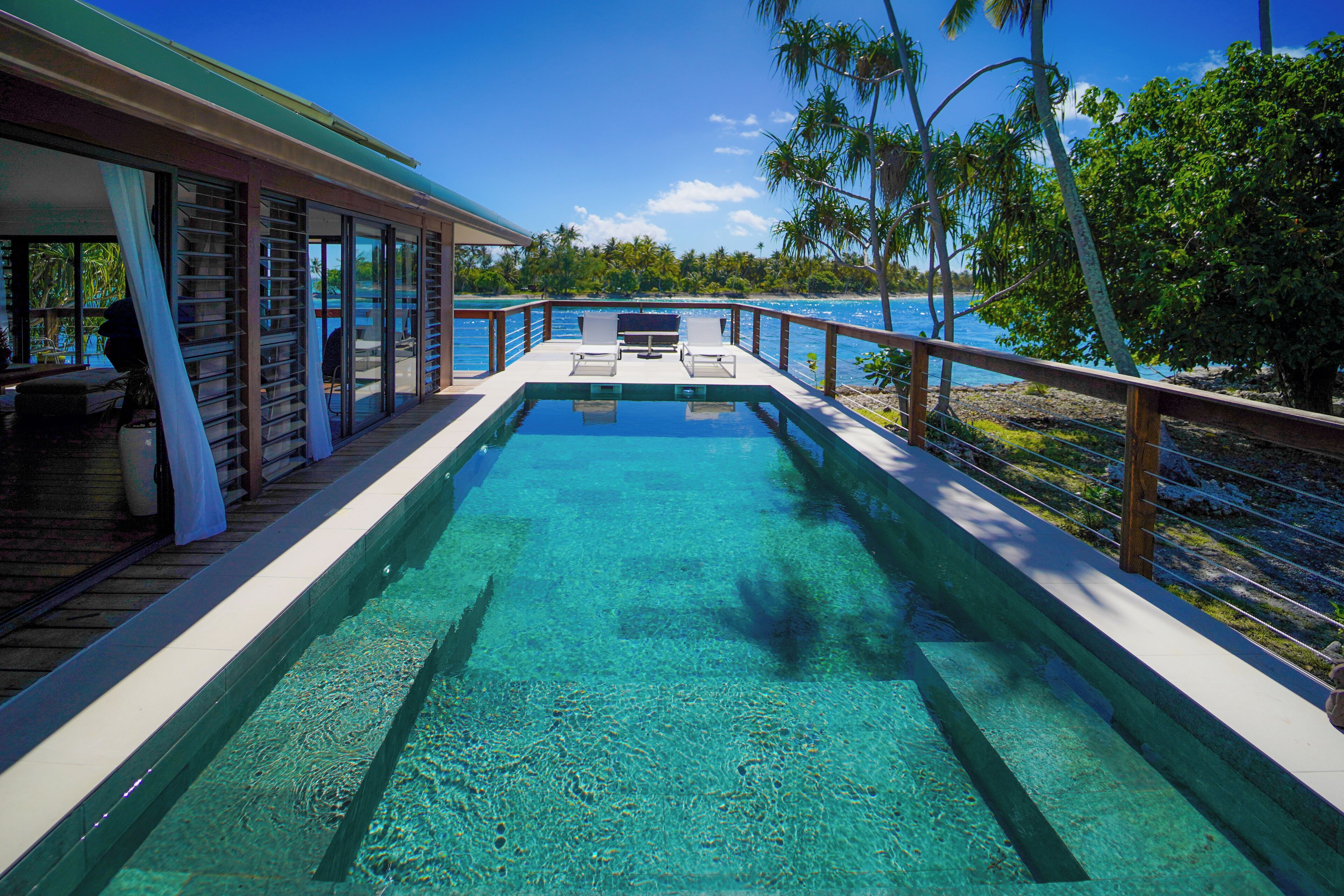 Outdoor pool, pool umbrellas, pool loungers