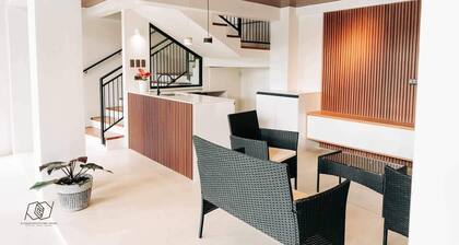 Cozy 3-bedroom condo with WiFi and fitness room in cool Tagbilaran City.