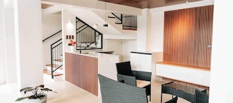 Cozy 3-bedroom condo with WiFi and fitness room in cool Tagbilaran City.