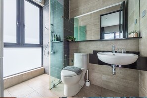 Shower, hair dryer, towels, soap