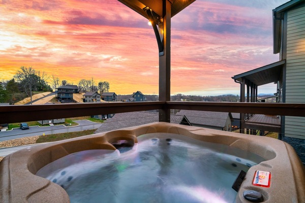 Relax in the hot tub and soak in the beautiful mountain view from the deck