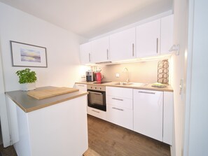 Réfrigérateur, four, plaque de cuisson, lave-vaisselle