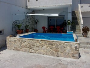 Departamento, 1 habitación, para fumadores, alberca privada | Restaurante al aire libre