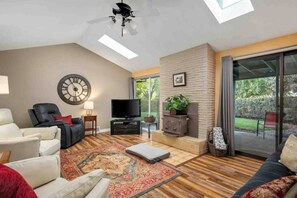 TV, books - Incredible Singe Level Layout w/ Immaculate Fenced Backyard, Covered Patio w/ Fire-Table, BBQ, Games (Hillsboro)