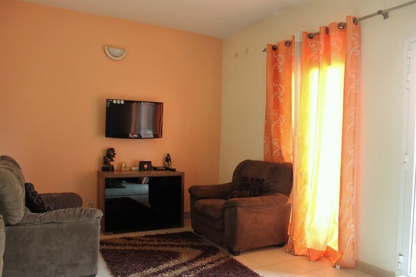 Apartment, 1 Bedroom, Smoking, Balcony | Living room - Quiet, Practical, Comfortable Apartment (Dakar)