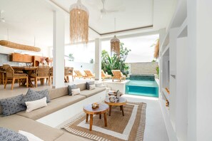 Basic Villa | Living area | 50-inch Smart TV with digital channels, streaming services, stereo - Villa Mayasa (Munggu)