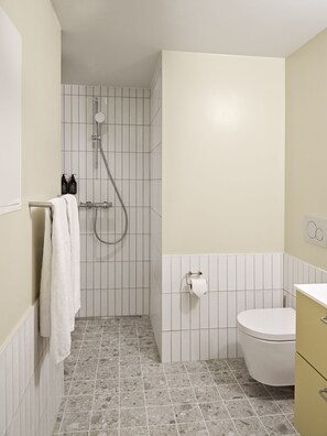 Shower, eco-friendly toiletries, hair dryer, towels