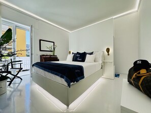 Superior-Apartment, Balkon, Gartenblick | 1 Schlafzimmer, Zimmersafe, kostenloses WLAN, Bettwäsche