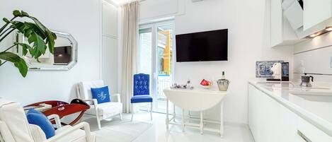 Superior Apartment, Balcony, Garden View | Living area | 32-inch flat-screen TV with cable channels, Netflix, streaming services