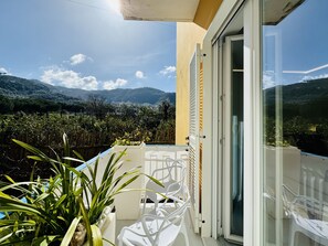 Departamento superior, balcón, vista al jardín | Vista al jardín