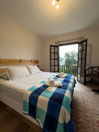 SUITE SUPERIOR COM SACADA E VISTA