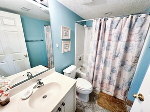 Shower, jetted tub, towels