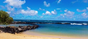 Tranquil Shores | 2BR Condo | Walk to Beach & Dining