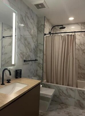 Hair dryer, towels, soap, shampoo