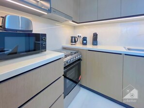 Appartamento (2 Bedrooms) | Cucina privata | Microonde, forno, bollitore elettrico