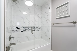 Eco-friendly toiletries, hair dryer, towels, shampoo