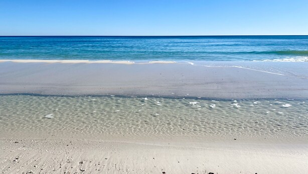 A beach with clear blue water and a sandy shore. - RP306 -  OMG This View! XL Corner Balcony! Indoor & Outdoor Pools! WOW! (Orange Beach)