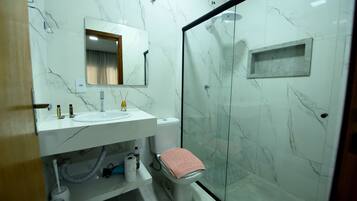 Hair dryer, towels, soap, shampoo