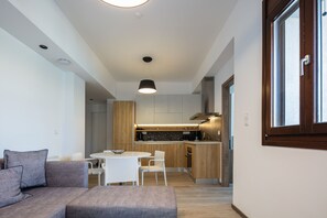 Suite – superior | Oppholdsområde | Flatskjerm-TV