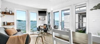 Houseboat moments of happiness for 4 people with roof terrace on the Baltic Sea fjord Schlei