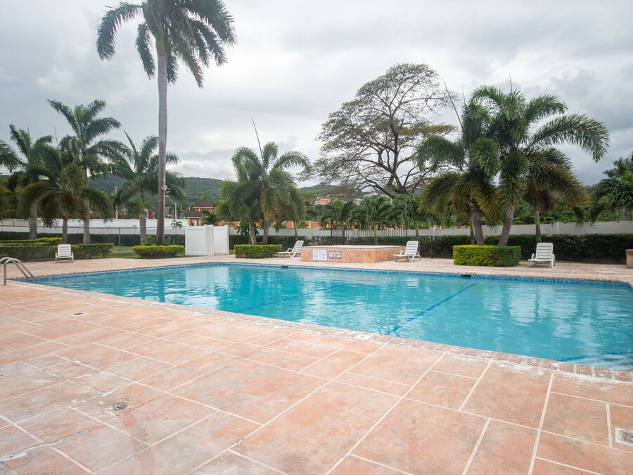 Outdoor pool, open 6:00 AM to 9:30 AM, pool umbrellas, pool loungers