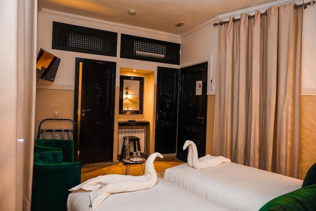 Kamar Double atau Twin, pemandangan halaman | Seprai katun Mesir, seprai premium, dan selimut bulu angsa