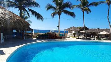 2 outdoor pools, open 9:00 AM to 9:00 PM, pool umbrellas, pool loungers