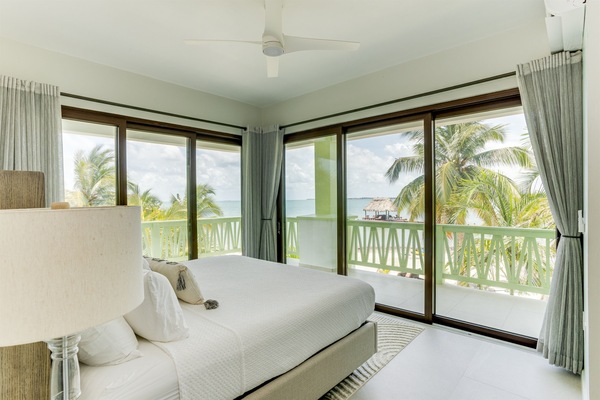 Bedroom 1: King Bed, Beach View & Patio Access