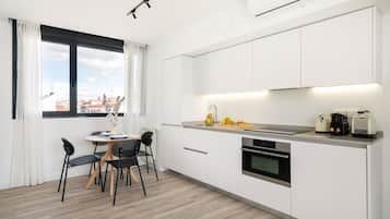Deluxe Apartment, 2 Bedrooms, Terrace, City View | Living area | 43-inch Smart TV with digital channels