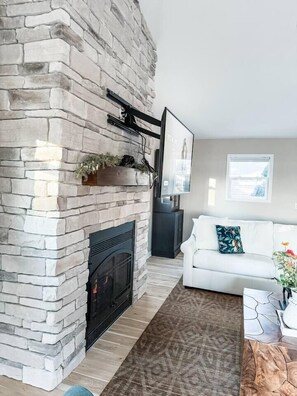 Smart TV, fireplace, table tennis, books