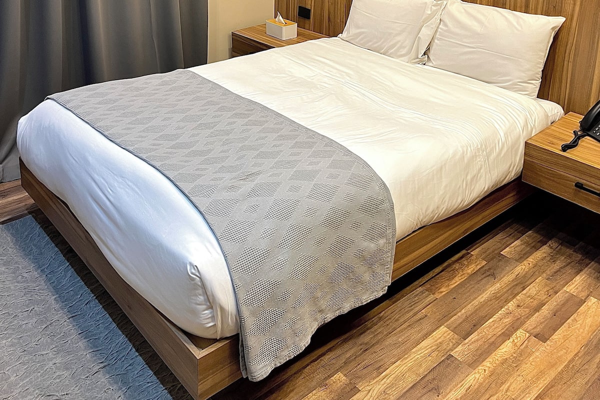 Egyptian cotton sheets, premium bedding, down duvets, memory-foam beds