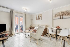 Living area - Apartment 'Verano Azul' with Shared Pool, Wi-Fi and Air Conditioning (La Mata)