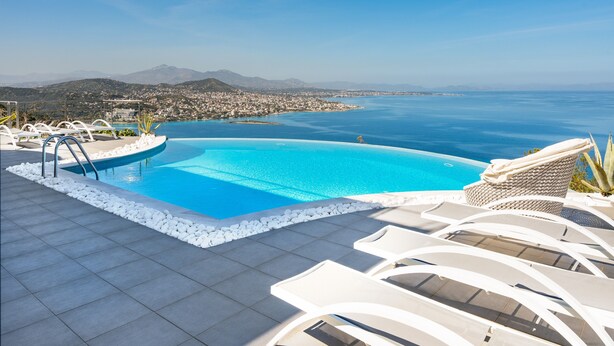 A swimming pool with a view of a coastal town and mountains. - Apartment "Villa Coral - First Floor" with Private Pool & Wi-Fi (Chamolia)