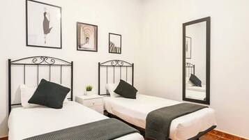 2 dormitorios, tabla de planchar con plancha, wifi gratis y ropa de cama