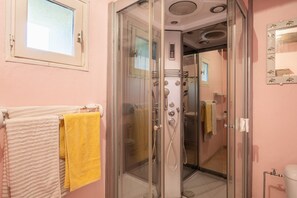 Shower, free toiletries, hair dryer, towels