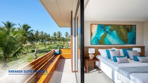 A modern bedroom with a large bed, a nightstand, and a painting of a tropical landscape. - Casa Beira-mar com 8 Suítes no Prestigiado Condomínio Iberostar - Praia do Forte (Açu da Torre)