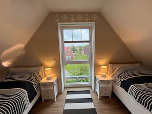 2 bedrooms, in-room safe, iron/ironing board, WiFi