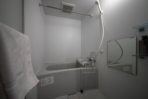 Basic Apartment | Bathroom | Free toiletries, hair dryer, slippers, toilet paper