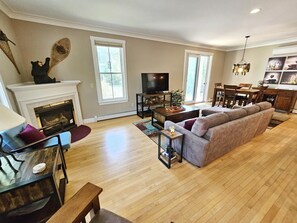 Smart TV, fireplace, books