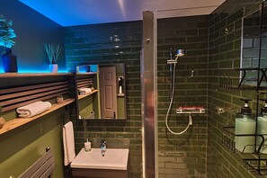Shower, hair dryer, towels, soap