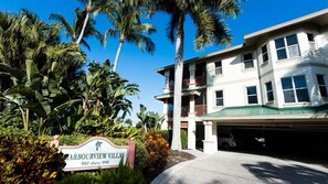 A multi-story building with a sign reading "Marbourview Villas 981 thru 990".