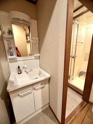Hair dryer, bidet, towels, soap