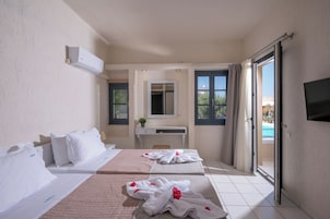 One Bedroom Apartment, Pool View | Premium bedding, in-room safe, laptop workspace, blackout drapes