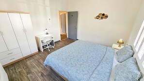 Desk, laptop workspace, free WiFi, bed sheets