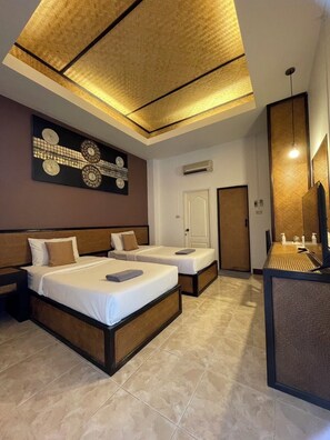 A hotel room with two beds, a large mirror, and a ceiling with a geometric pattern. - Sleep Cnx (Chiang Mai)