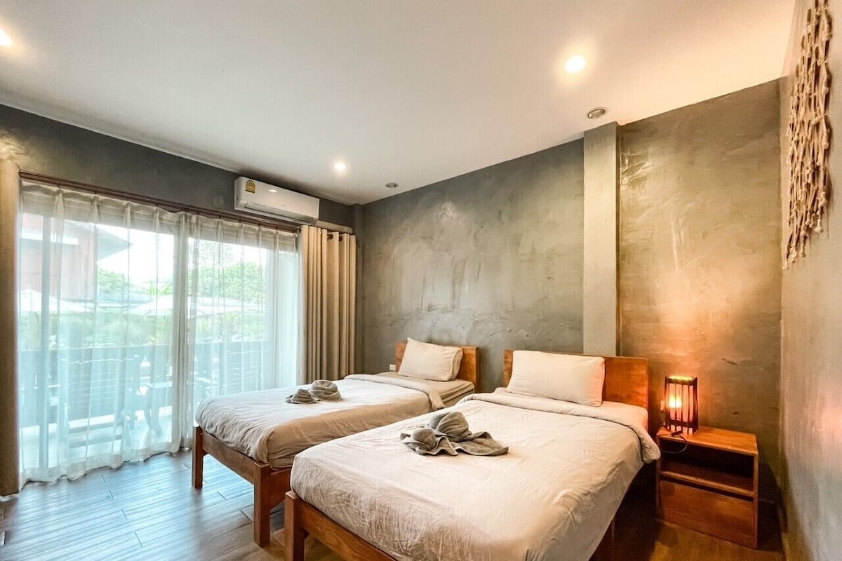 Habitación Deluxe con 1 cama matrimonial o 2 individuales, 2 camas individuales, para no fumadores | Insonorización, wifi gratis y ropa de cama